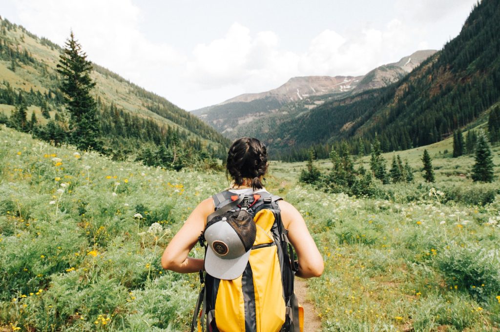 Girl on a meadow hiking