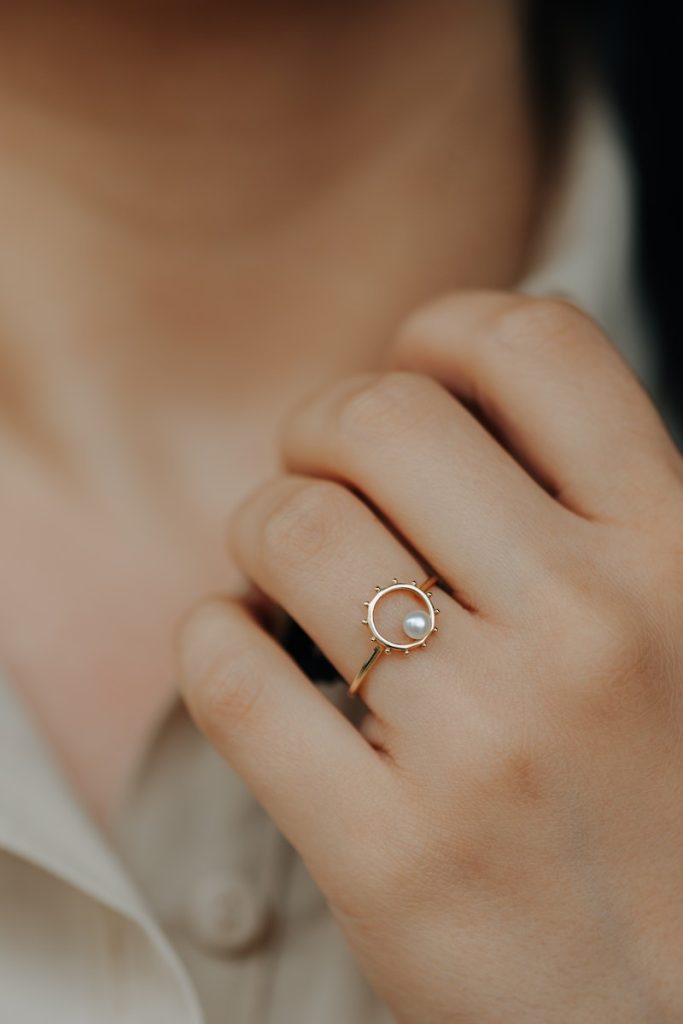 Girl wearing a golden ring